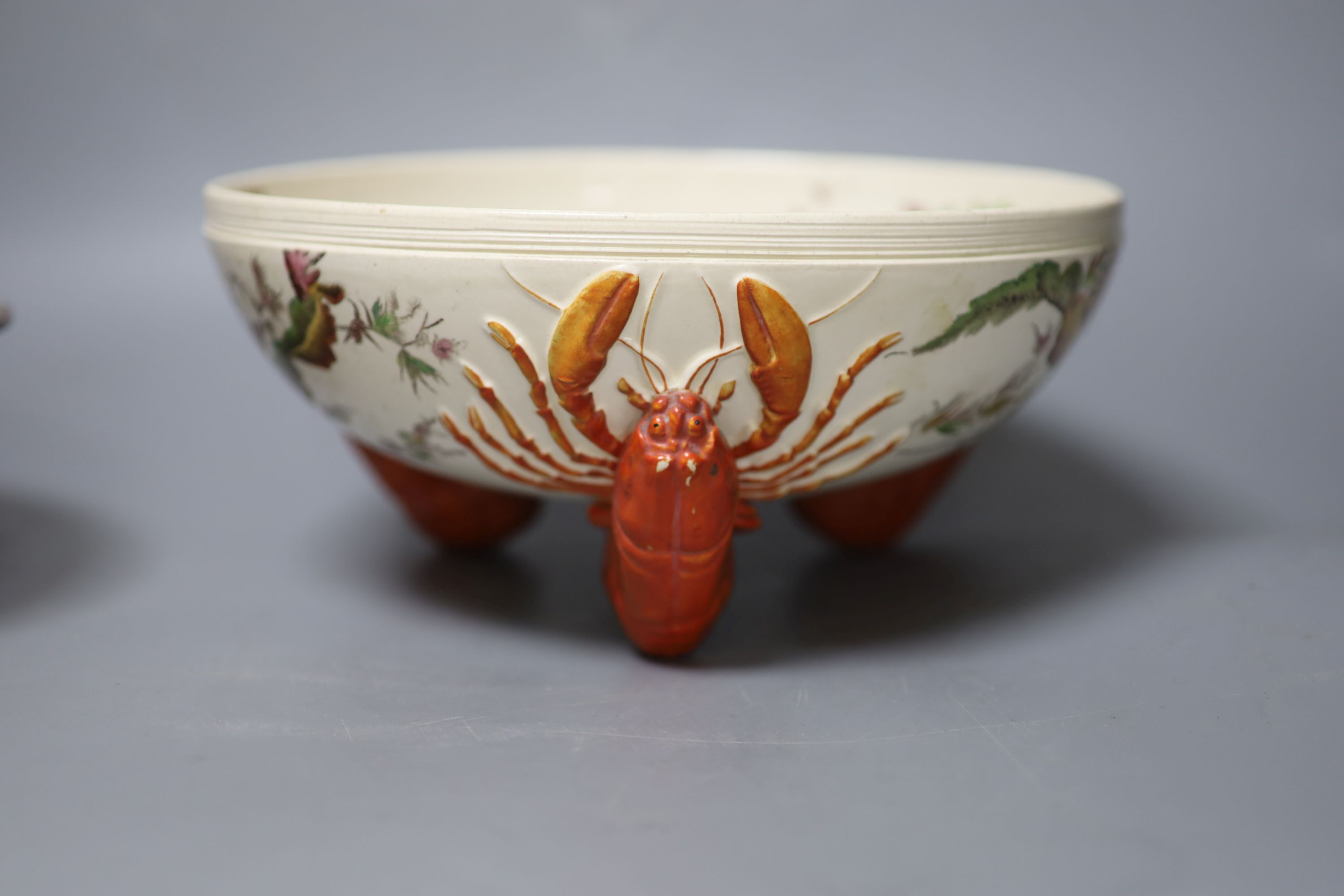 A Wedgwood majolica dolphin footed dish, a lobster footed bowl and an oval tray (3)